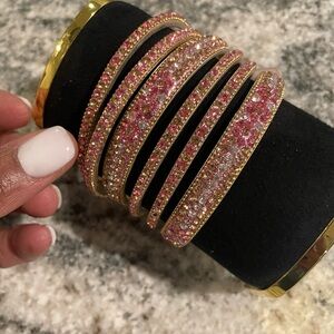 SIX PINK BANGLE BRACELETS